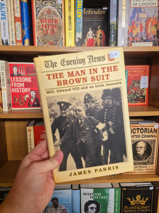 The Man in the Brown Suitn- James Parris