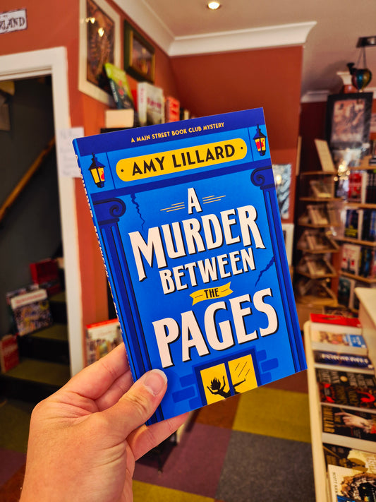 A Murder Between the Pages - Amy Lillard