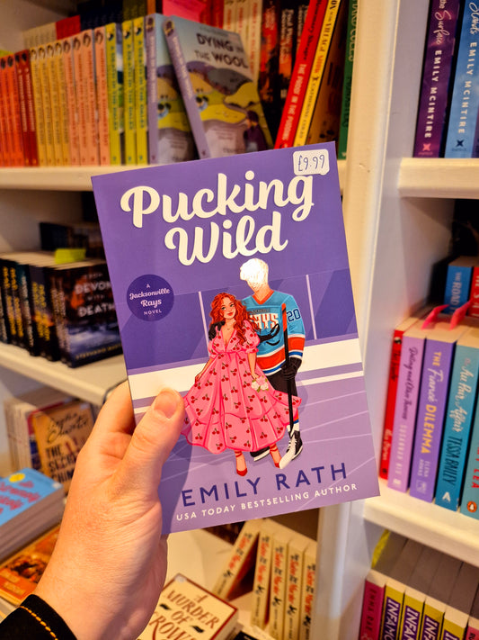 Pucking Wild - Emily Rath